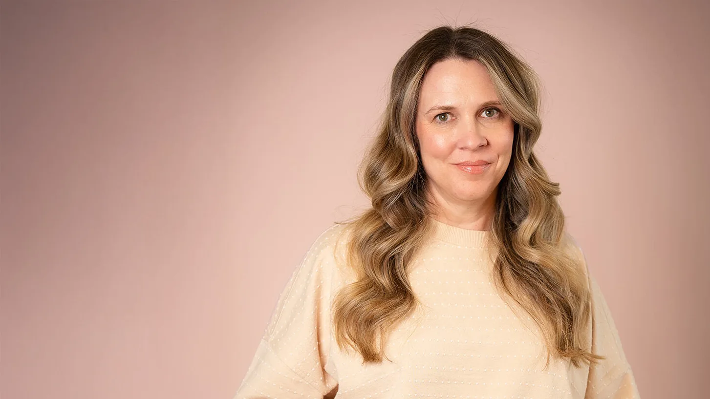 founder christi carnahan on pink background