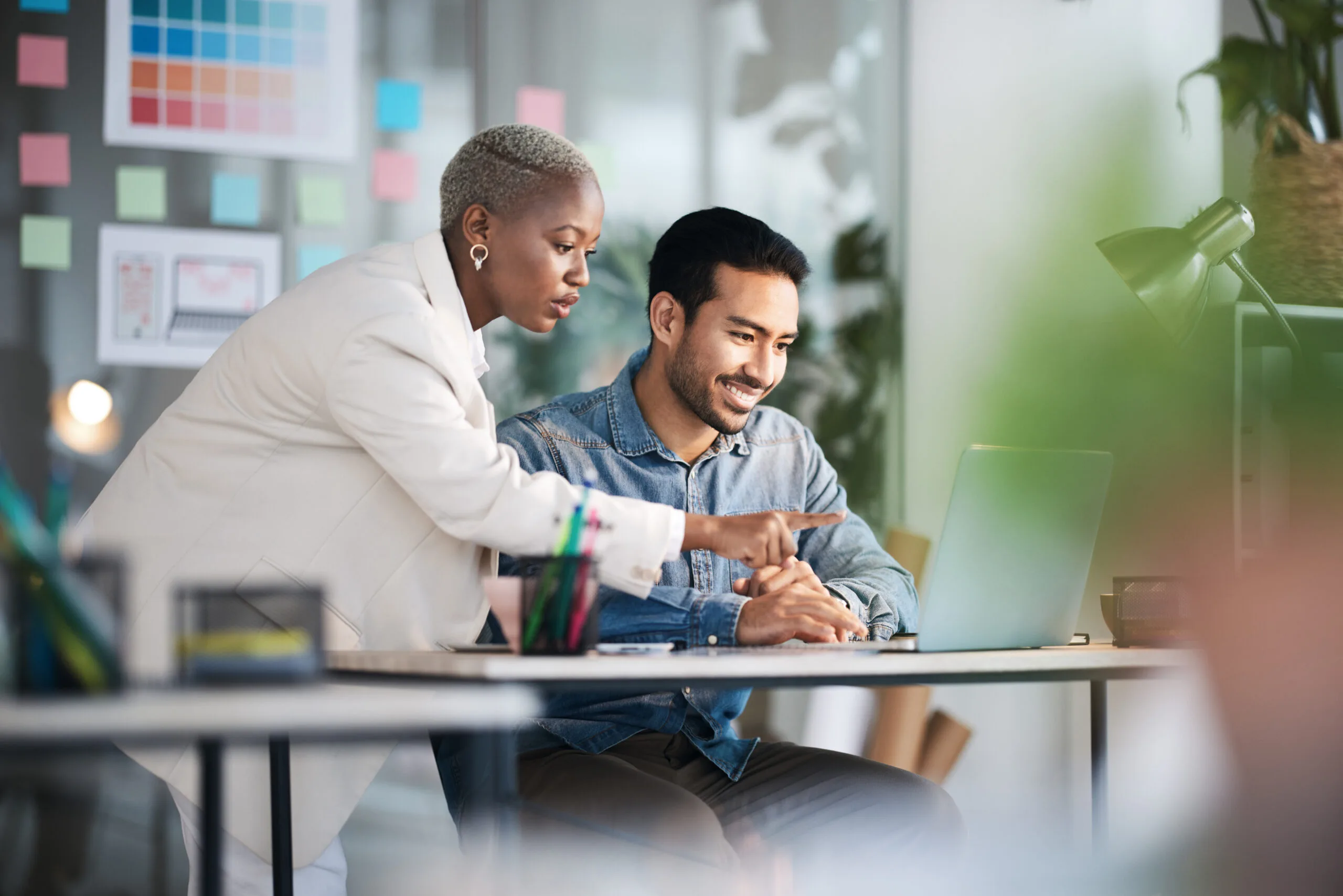 Office laptop, diversity teamwork and happy people review media application layout, creative design or research project. Collaboration, designer or professional team working on app development report
